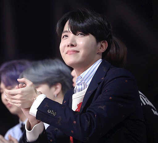 J-Hope at the 2018 Melon Music Awards wearing a black suit and bowtie