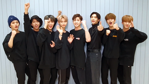 Stray Kids posing for JYP Entertainment's audition campaign in 2019