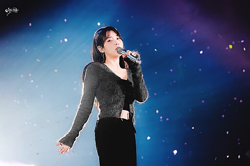 IU on stage during her 2023 fan concert ‘I＋UN1VER5E’ in Seoul