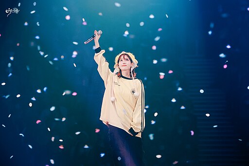 IU performing during the HEREH World Tour Concert in Seoul on March 10, 2024