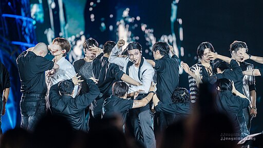 ATEEZ performing live on stage in New York City, August 2024