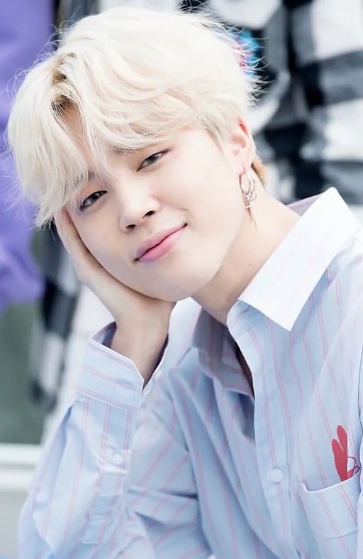 Jimin of BTS in a white outfit during a Dispatch White Day photoshoot