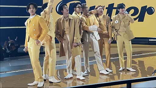 BTS at the American Music Awards 2021, group photo on red carpet.