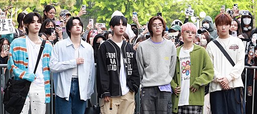 BOYNEXTDOOR members posing at Music Bank in 2024