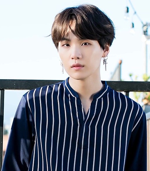 Min Yoon-gi (SUGA) of BTS in May 2018 during a public appearance.