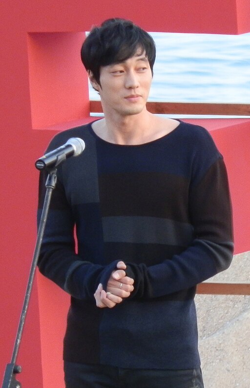 So Ji-sub attending the 2011 Busan International Film Festival.