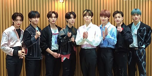 Stray Kids pose confidently during their 2023 promotional shoot