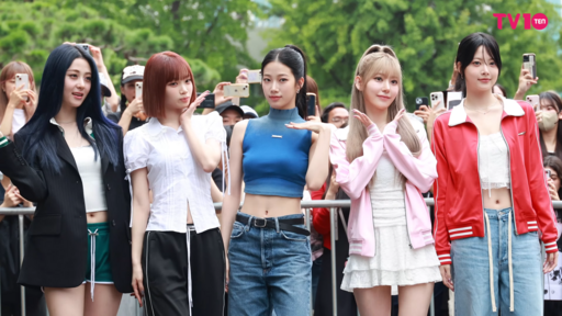 LE SSERAFIM members captured outside Music Bank, dressed stylishly before their performance appearance.