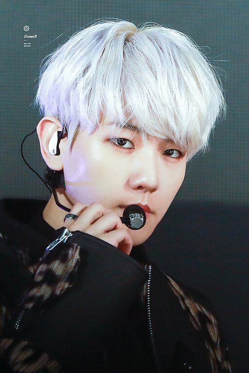 Baekhyun with white hair in a close-up shot