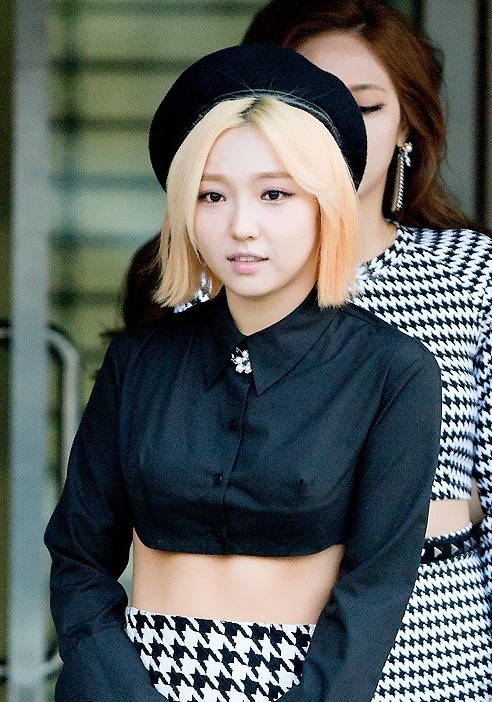 Min from miss A on the red carpet at the 2014 K-Pop Awards, posing in a black dress.